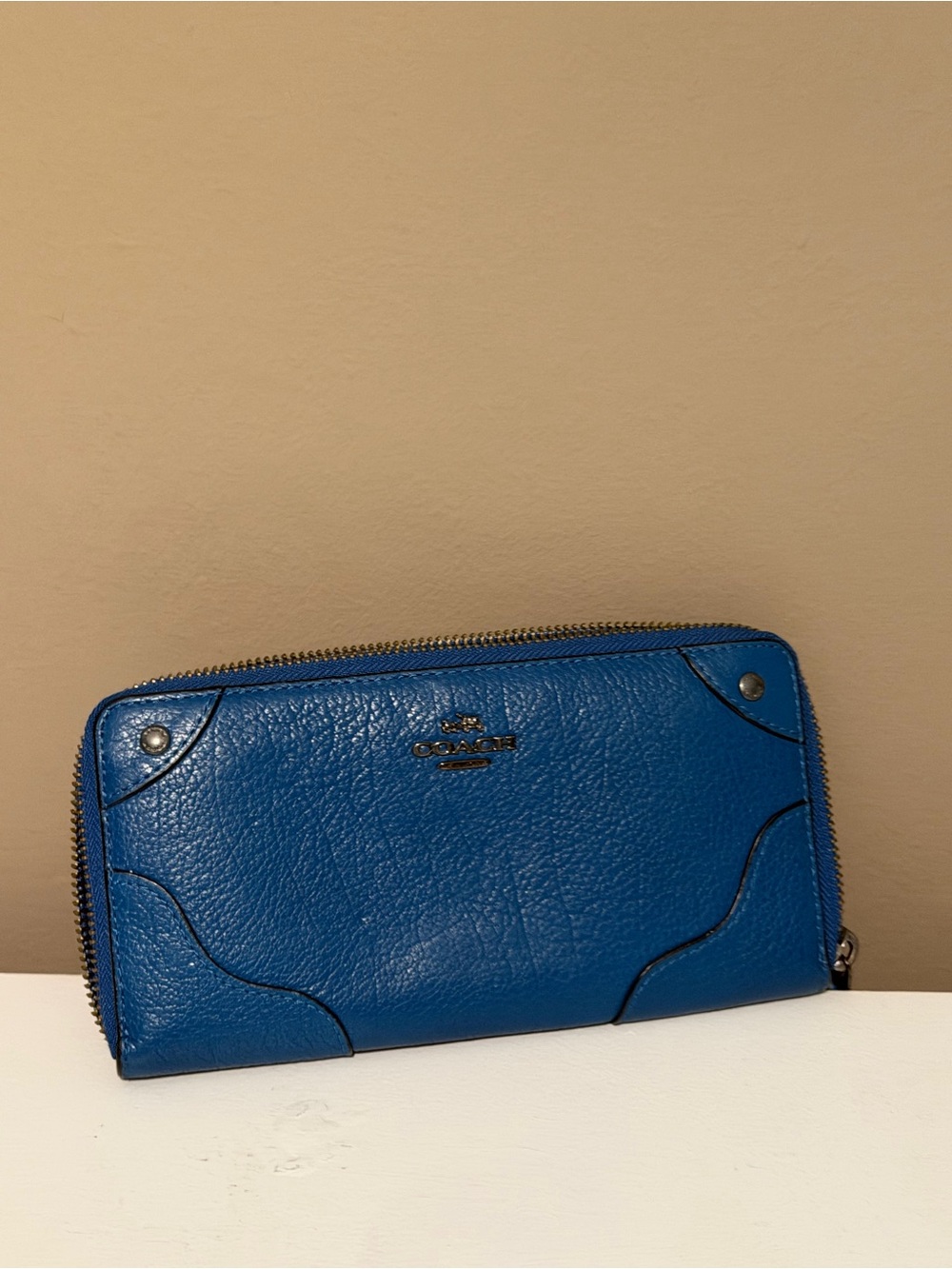 Coach Blue Pebbled Leather Zip-Around Wallet with Metal Logo